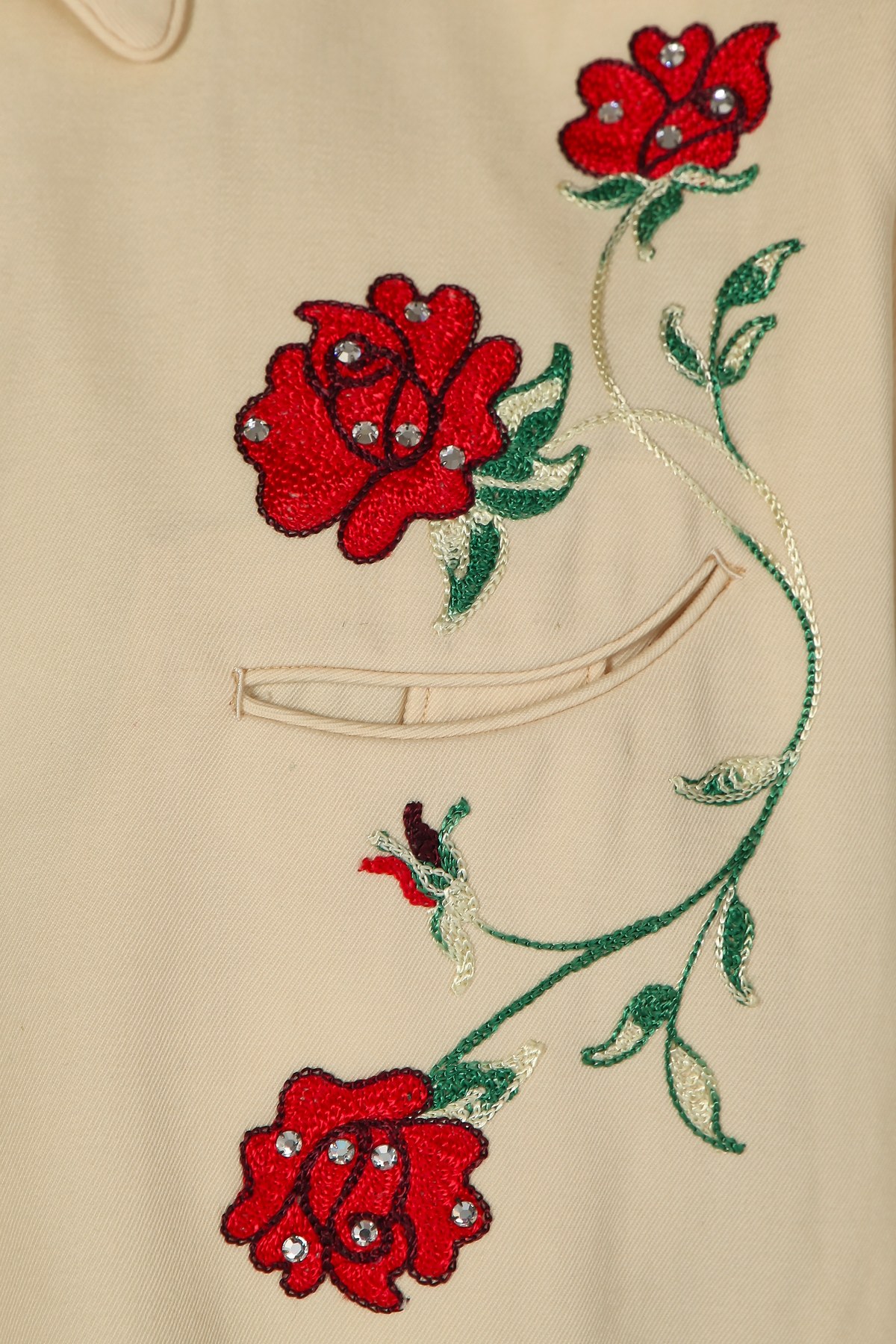 Rose embroidery and pocket detail