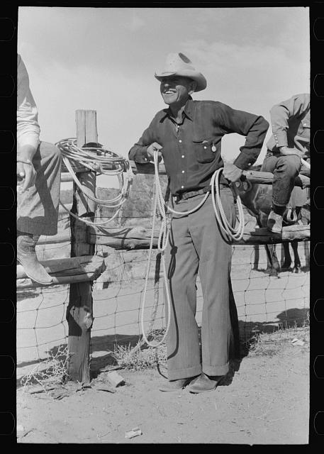 Photograph or document from Library of Congress, Russell Lee, *Cowboy at rodeo, Quemado, New Mexico*; this view is shown as part of the Western wear visual archive.