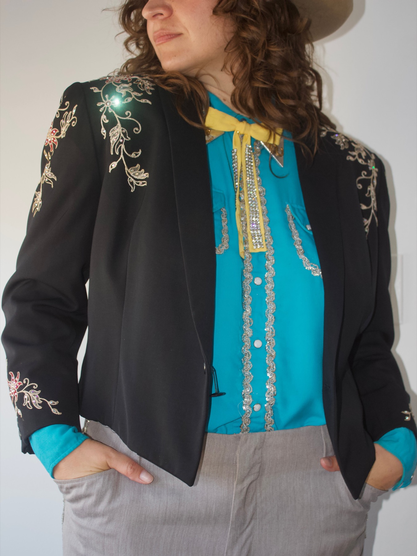 Seller-presented view of the black embroidered jacket carrying a Viola Grae / California label.