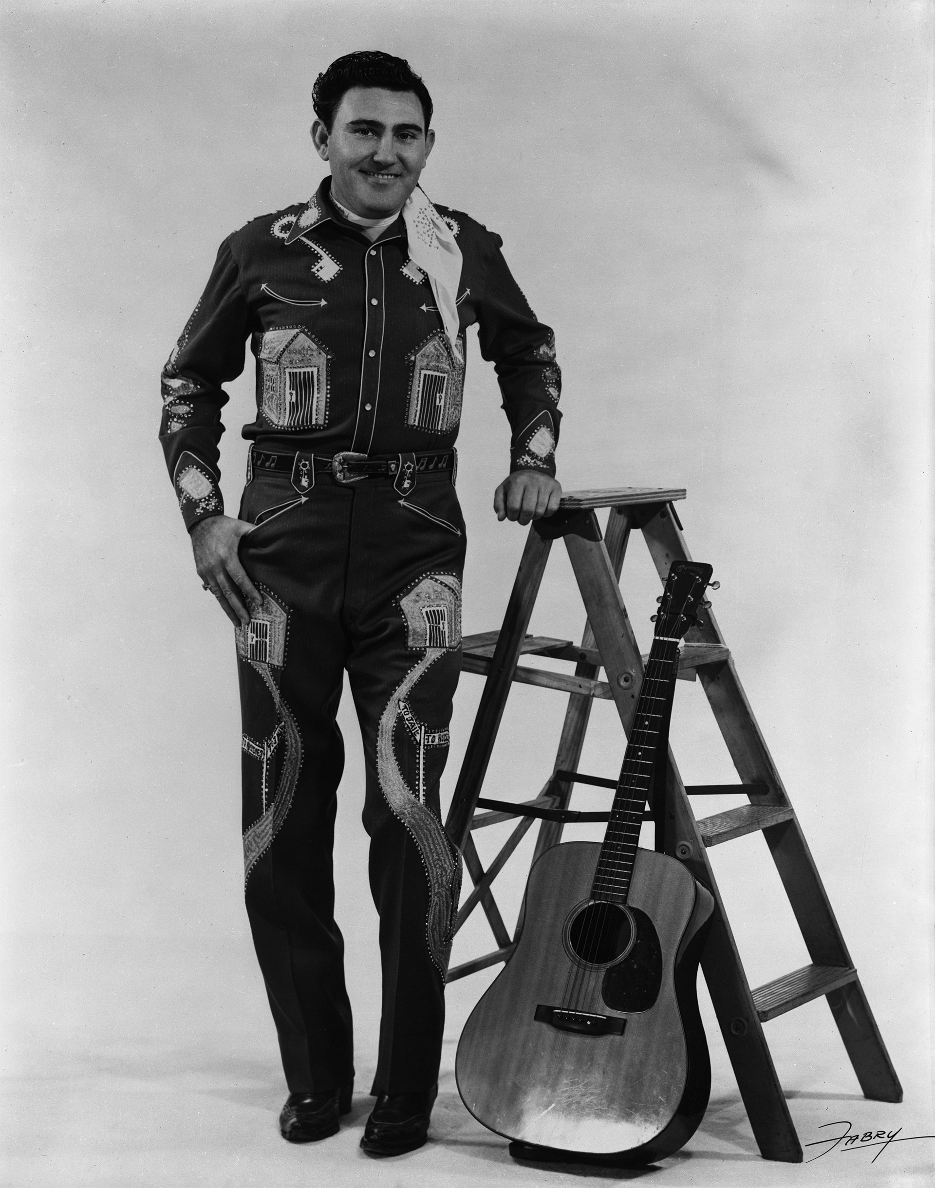 Webb Pierce in his jailhouse-themed suit, 1961