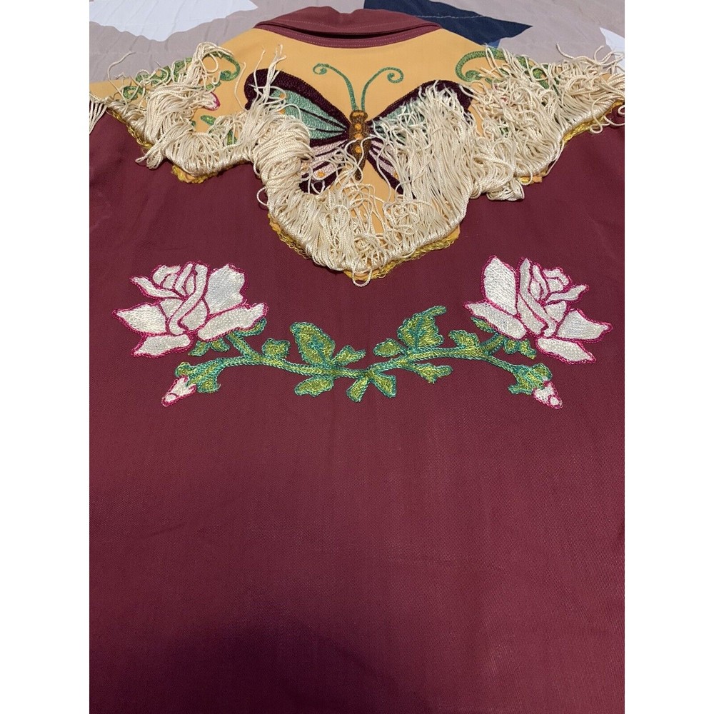Fringed butterfly yoke and floral embroidery