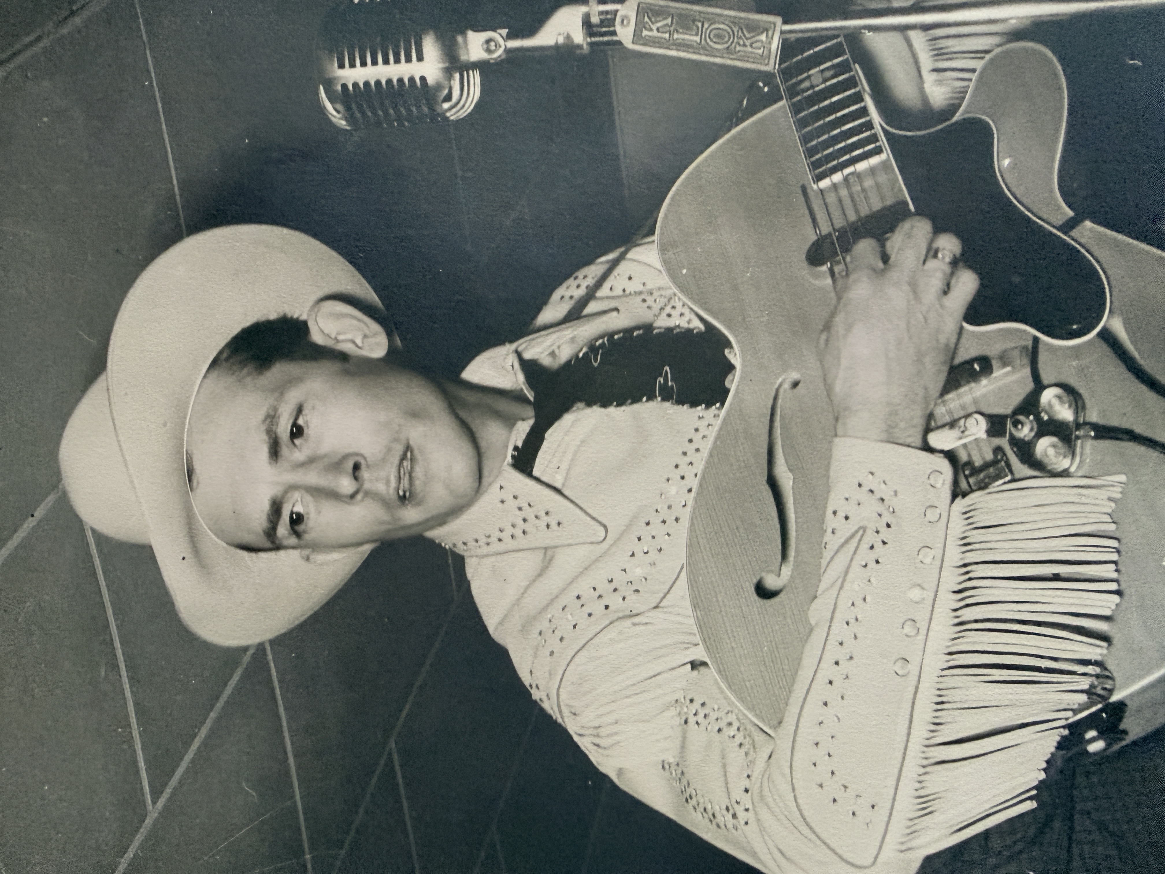 Hank Williams Sr. with an electric guitar