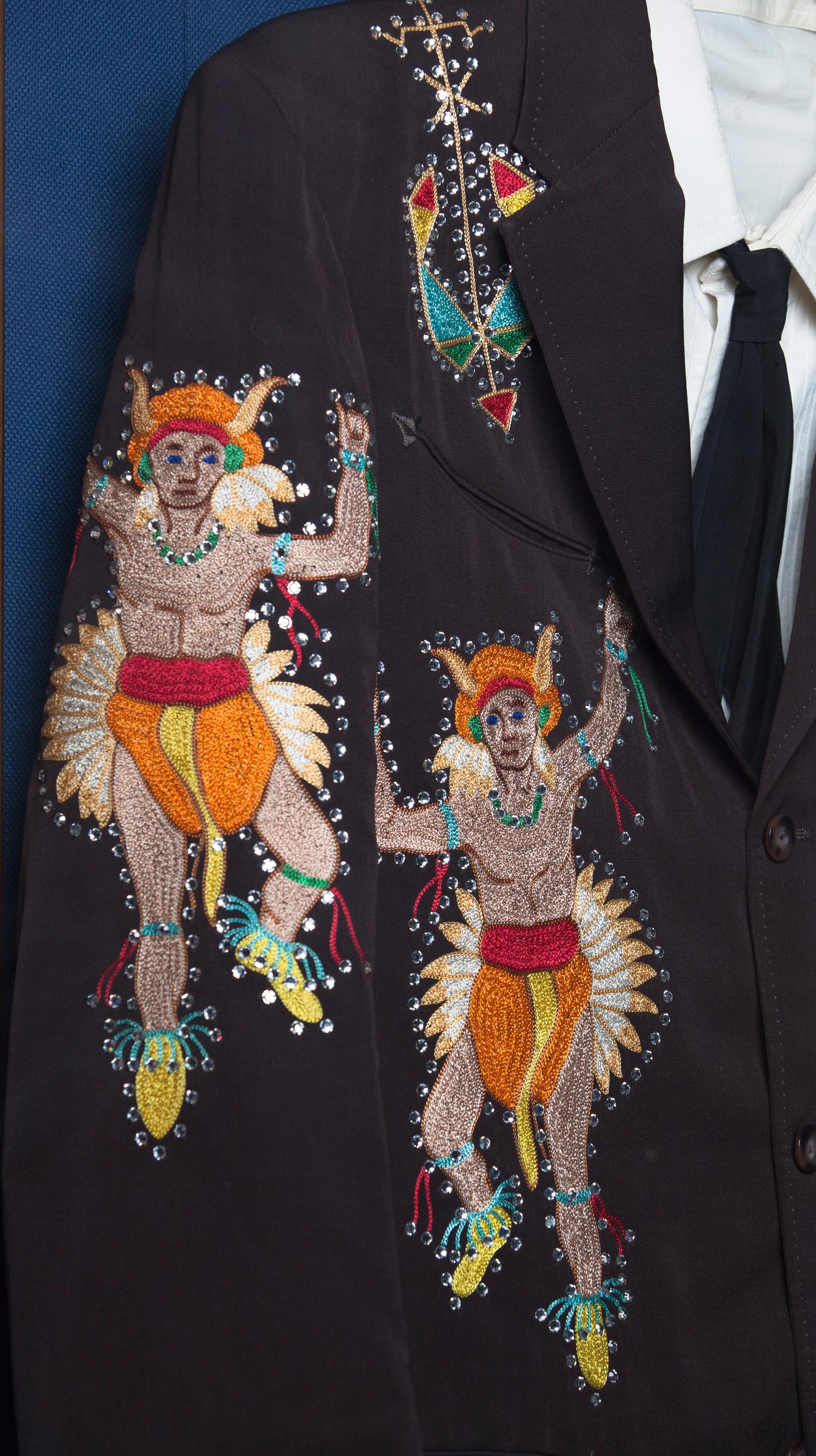 Black embroidered suit on display at the Texas Country Music Hall of Fame and Tex Ritter Museum; UNT identifies it as a Nudie Cohn suit for Ray Price. Photograph by Randy Mallory, 2015.
