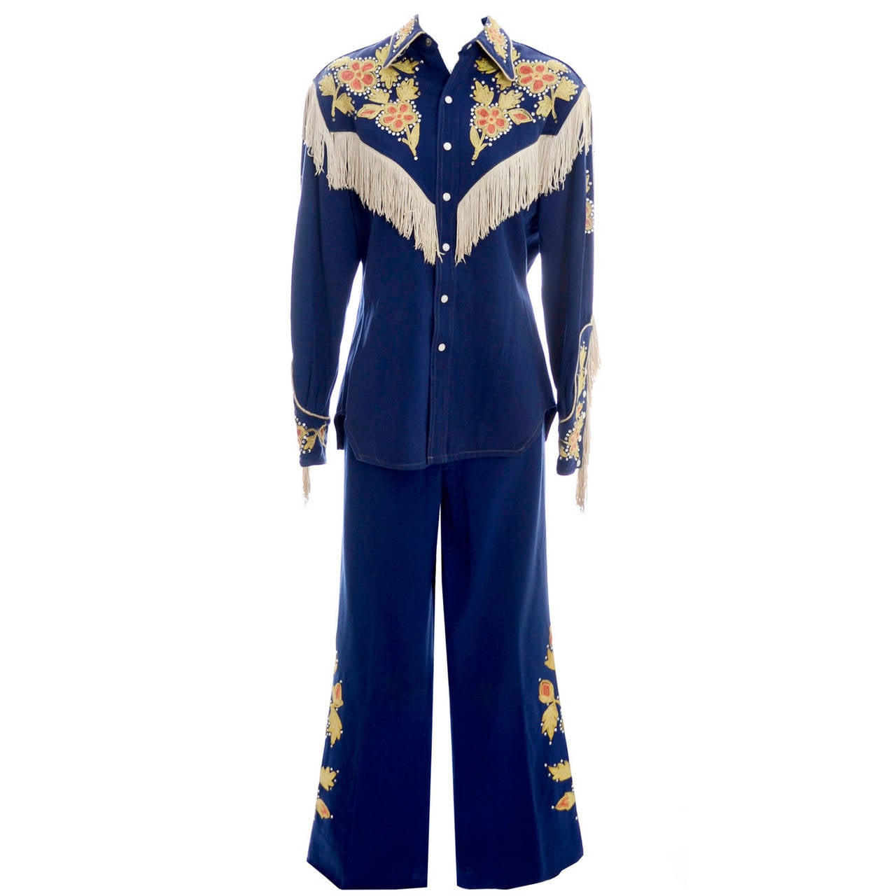 Blue Fay Ward Co. two-piece outfit: floral yokes, white fringe and broad trousers.