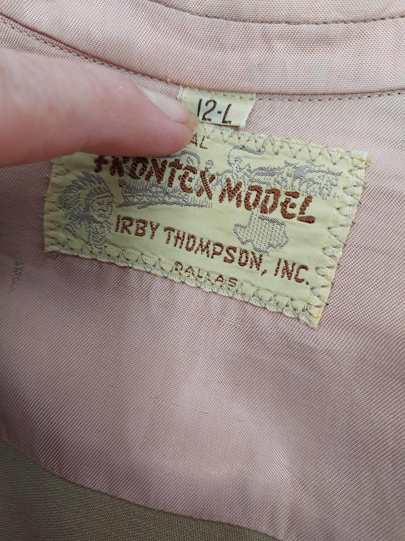 “An Original Frontex Model” label on seller-photographed shirt