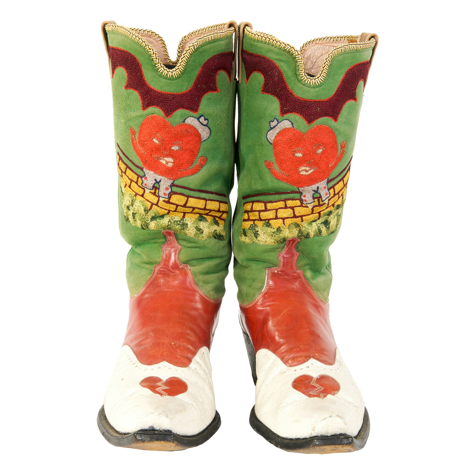 Hank Thompson’s “Humpty Dumpty Heart” boots, 1964, as presented by the Country Music Hall of Fame; the museum credits the embroidered scene to Viola Grae.