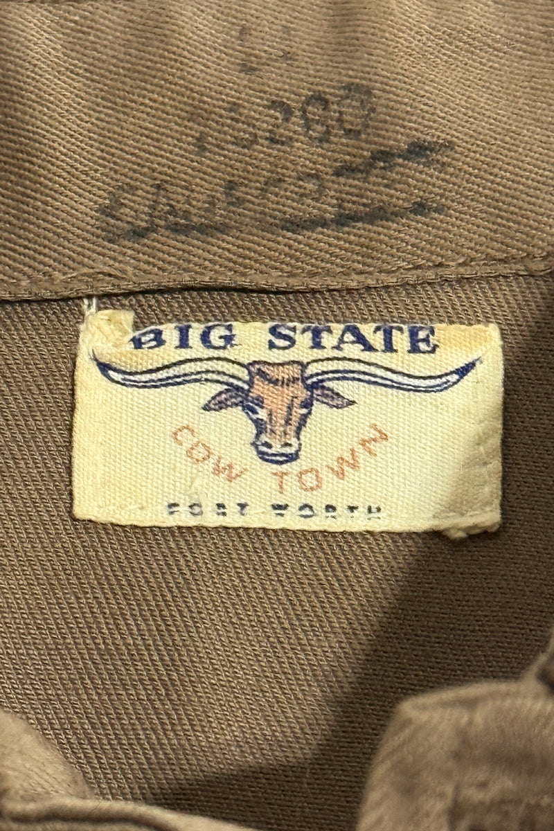 A close view of the neck label visibly reads Big State, Cowtown and Fort Worth. Those words are evidence on this shirt; its maker and production date remain open.